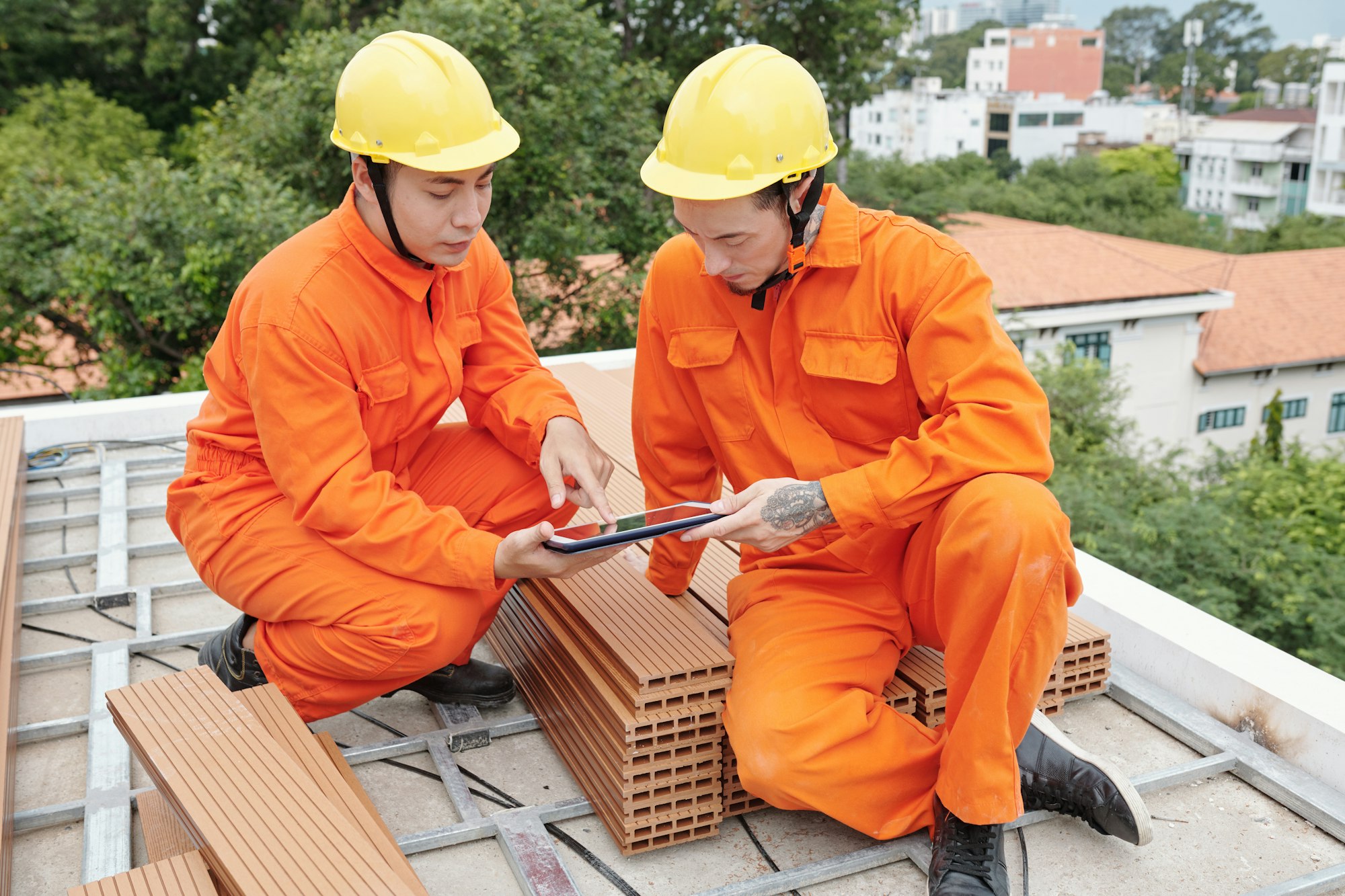 Foreman Talking to Roofing Contractor